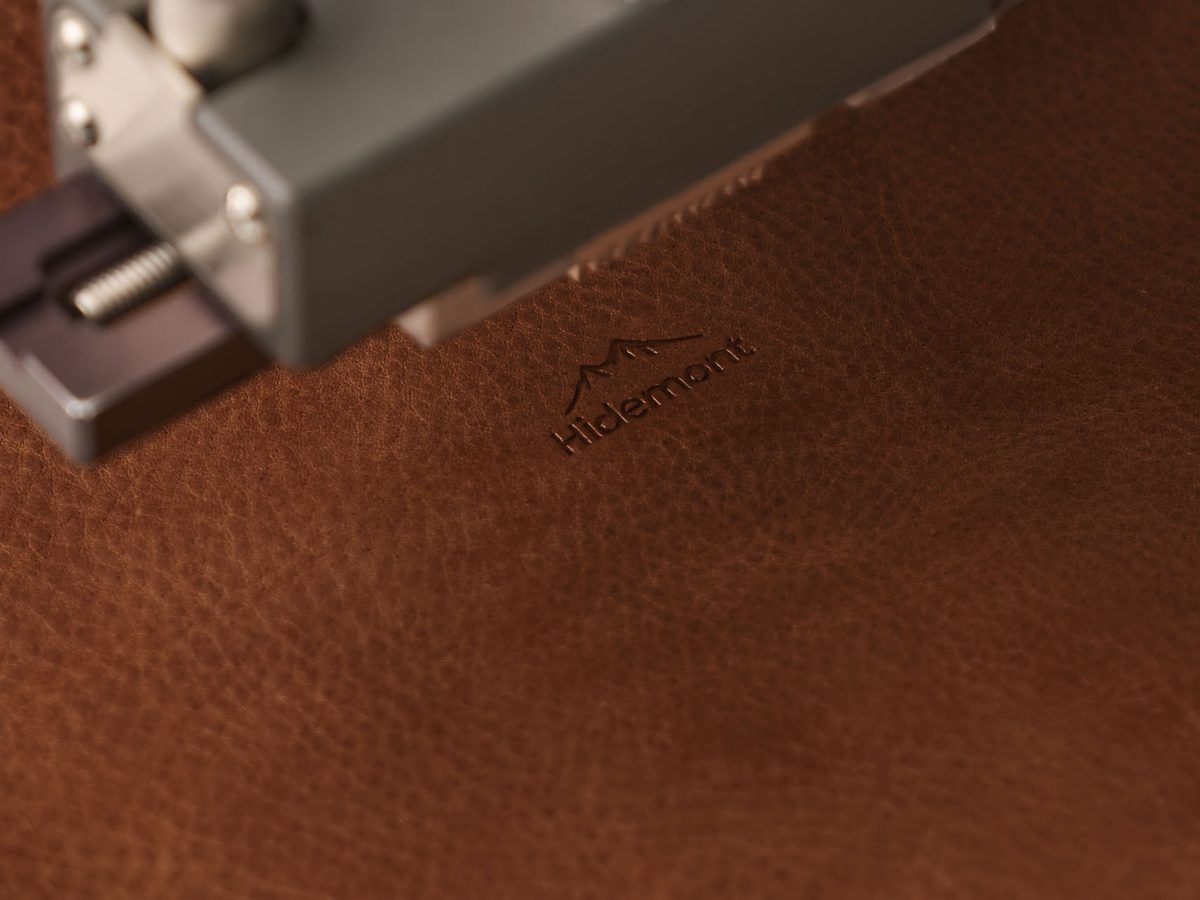Hidemont logo hot-stamped on brown leather